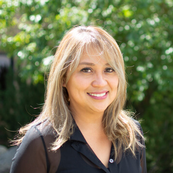 A portrait photo of Dr. Mylene Reinicke a dentist in Colorado Springs